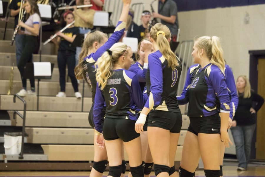 The lady Rangers huddle together during the second match of Tuesdays home game.