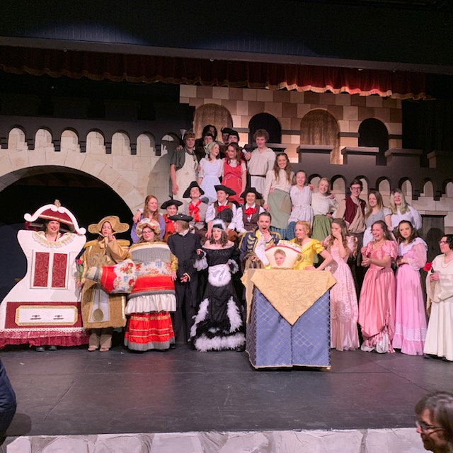In this photo taken at the end of the final performance, the Beauty and the Beast cast expresses a variety of emotions. 