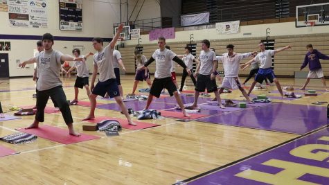 Students of the park high strength and conditioning class get their stretch on
