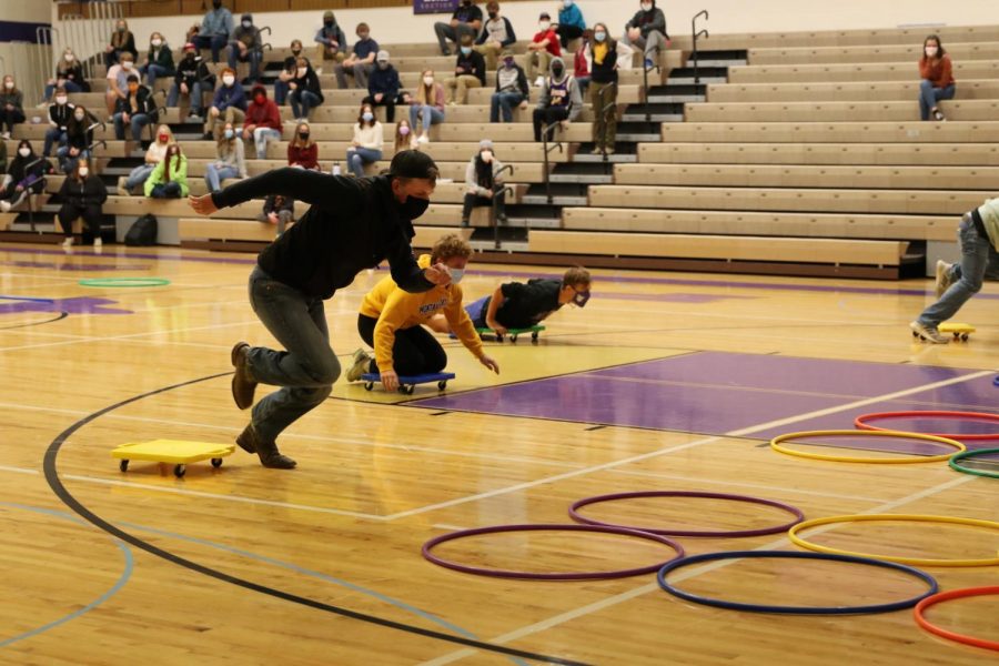 John Adams leads the pack in the Homecoming assembly relay race Wednesday, Oct. 21.