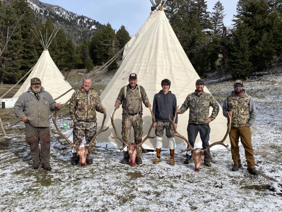S&W outfitters celebrate killing three bulls over a six day hunt. Kipp and Wilson Saile (center), guided John and Bob (on the left), and Jordan Yungbouer Guided Jimmy (on the right).