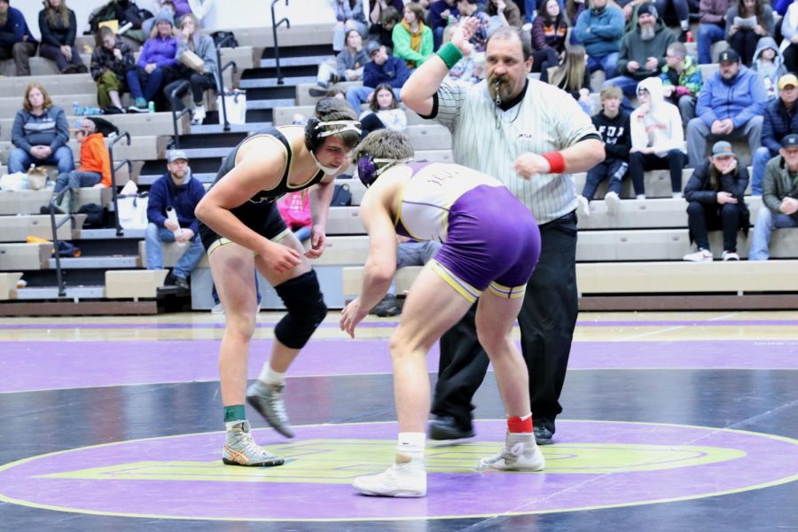 Cade Gubler wrestles against a Laurel wrestler. Senior Cade weighs in at the 182 weight class and lost one match and won another.