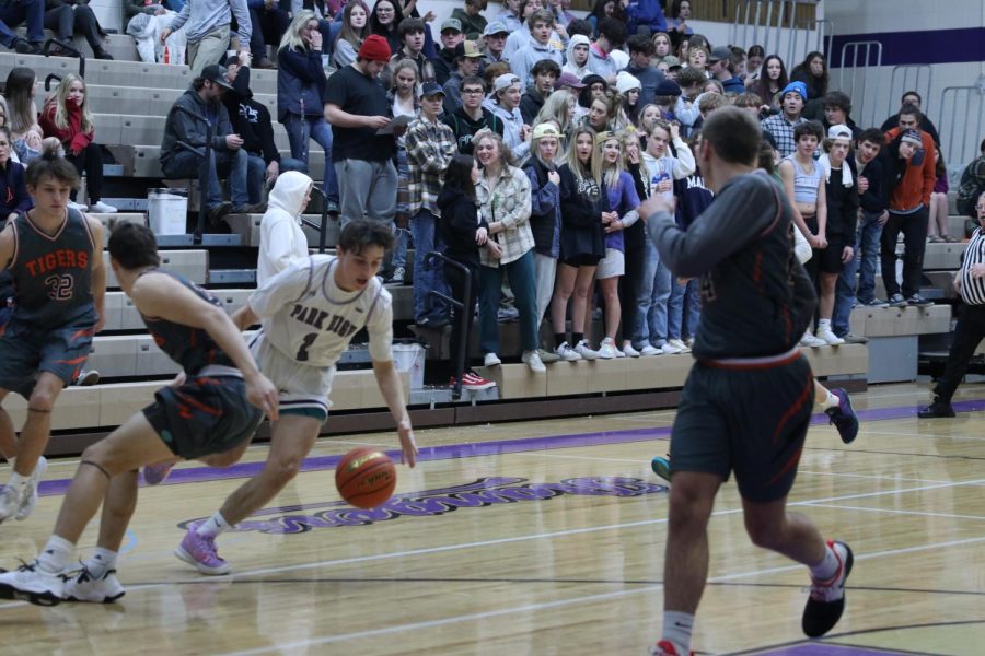 Drew Rogge takes it to the hoop At home against Manhattan.