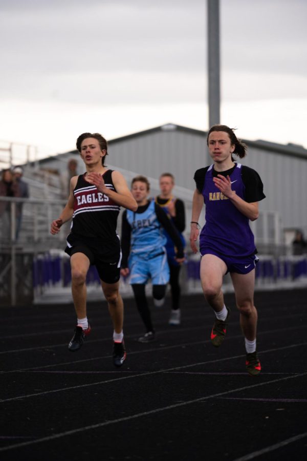 Freshman Brinley Halland finishes strong in the 200 at the home track meet on April 21.