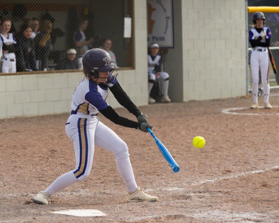 Sophomore+Erika+Haines+swings+at+a+low+strike+during+her+at+bat+against+the+Dillon+Beavers+on+April+1.+