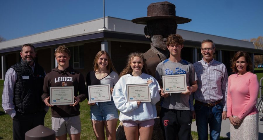 Ryan Anderson of First Interstate Bank poses with the third place winners of the Montana Economics Challenge: Carter Bartz, Taylor Young, Cassiday Fletcher and River Smith. On the right, Matt Jones of Montana Rail Link and Economics teacher Joey Lane.