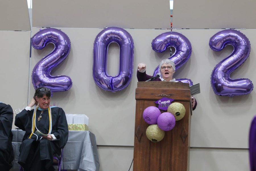 English teacher Lynnette Evanson gestures towards the audience in her teacher address, capping a career of 40 years teaching.