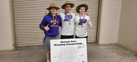
Three wrestlers pictured earning state medals
Trae DeSaveur-4th place(shown left), Danyk Jacobsen-1st place
(shown middle), Gage McGillvray-5th place(shown right)
