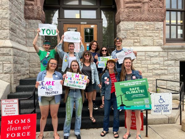 Former teacher, Alecia Jongeward gathers with the members of the Park High Green Initiative at the Held v. Montana court case. 
