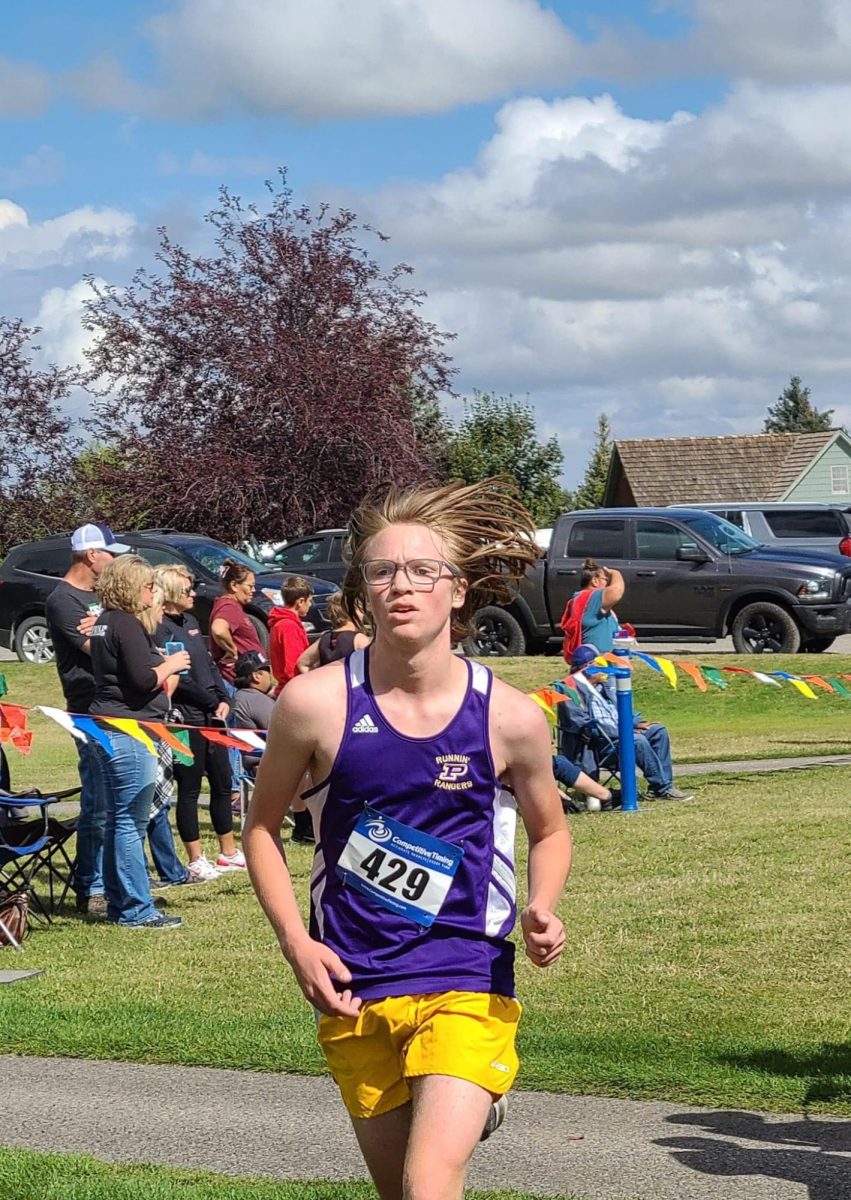 Junior Augie Stern nears the finish line at the Red Lodge race last week.  The PHS boys cross country team placed first by three points.