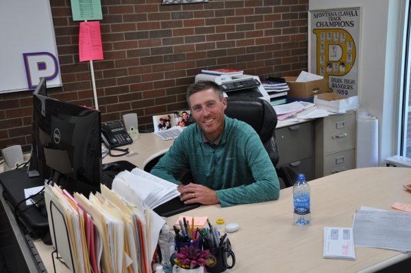 Athletic directer of the year Nate Parseghian working hard in his office.