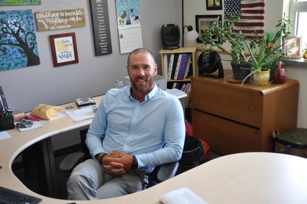 Coach Hahn takes on the challenge of a new administrative role while subbing for vice principal Becky Ayler last week.