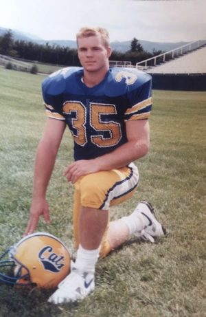 Bryan Beitel, Social Studies Teacher, models for Montana State University football team.