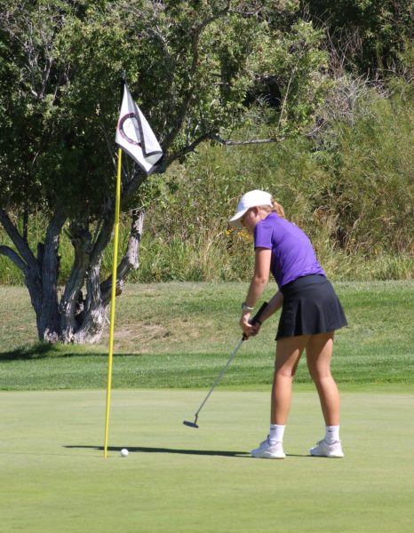 Emma Malloy, (grade), putting into the eighth hole at Livingstons Golf Course. 