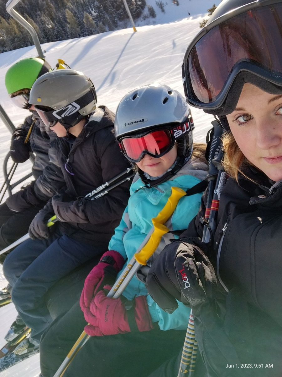Lily Minnick takes a selfie on a ski lift at Bridger Bowl.