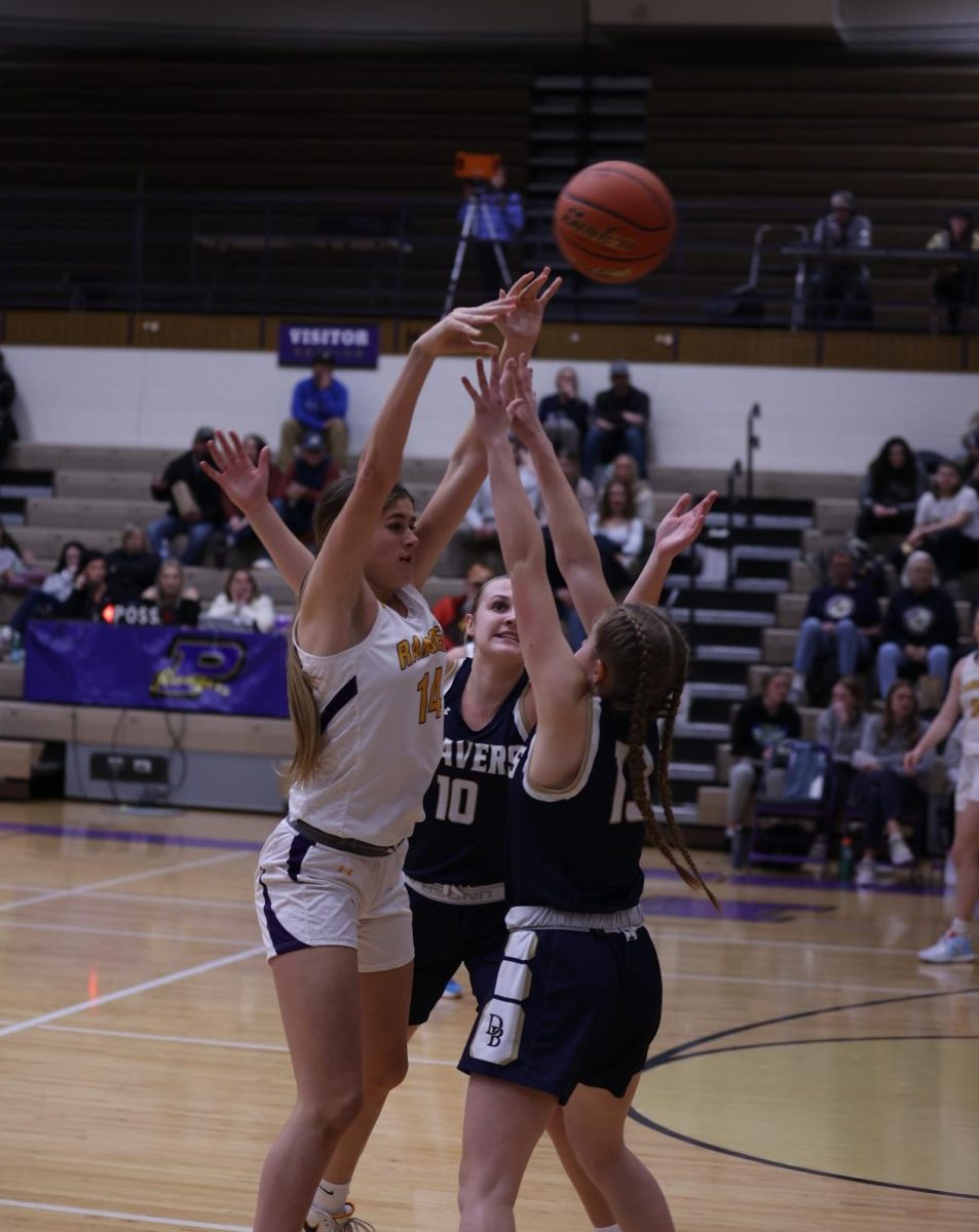 Chase Vermillion uses her height to her advantage to make a pass.