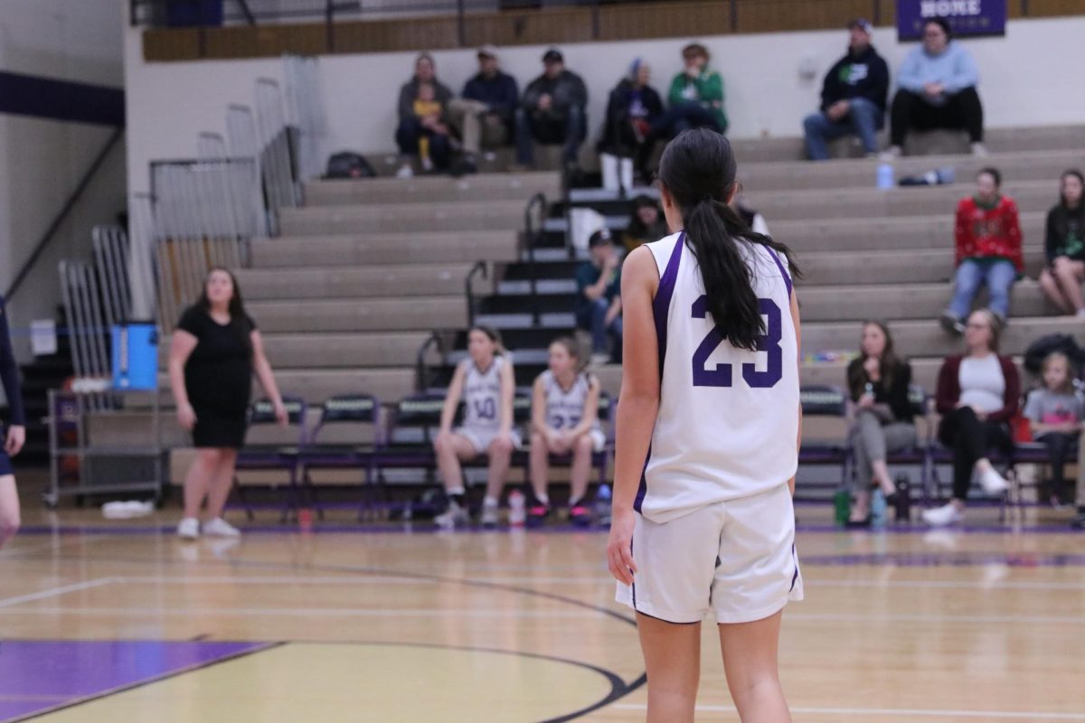 Freshman Carlie Bober gets ready to receive the ball in there basketball game against Miles City on December 22. 
