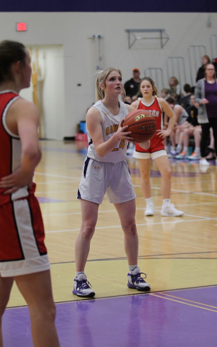 Senior+Emily+Jesson+prepares+to+shoot+a+free+throw+shot.+Jesson+made+both+of+her+free+throw+opportunities+during+the+home+game+on+January+27th.