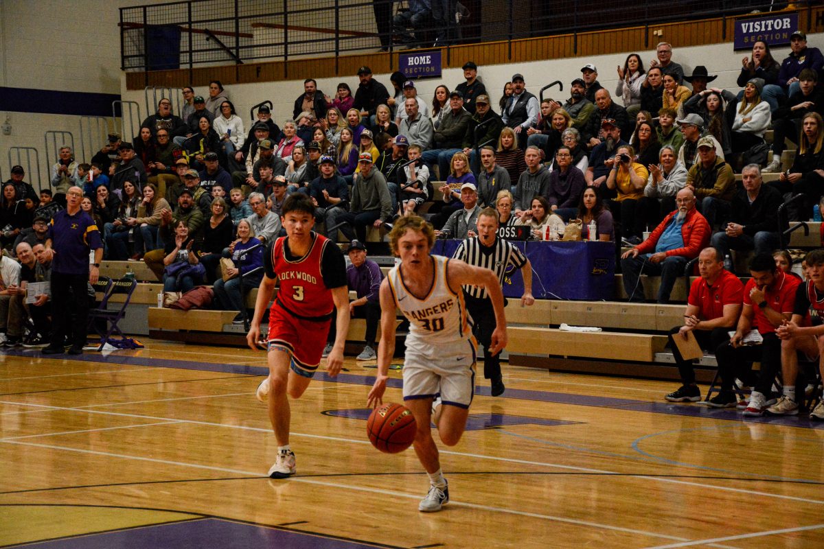 Senior Kimball Smith steals the ball for a fast break layup. Smith would miss the layup during the Rangers loss to Lockwood on Saturday night.