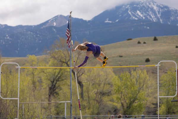 Asa Duncan pole vaulting at home track meet in the 2023 season.