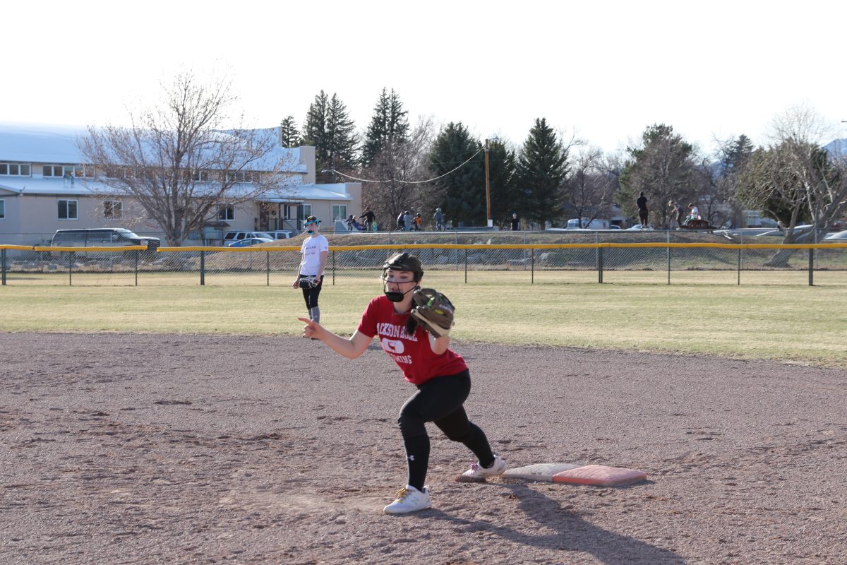 Kamryn Miller catches the ball at first base to make the out. 