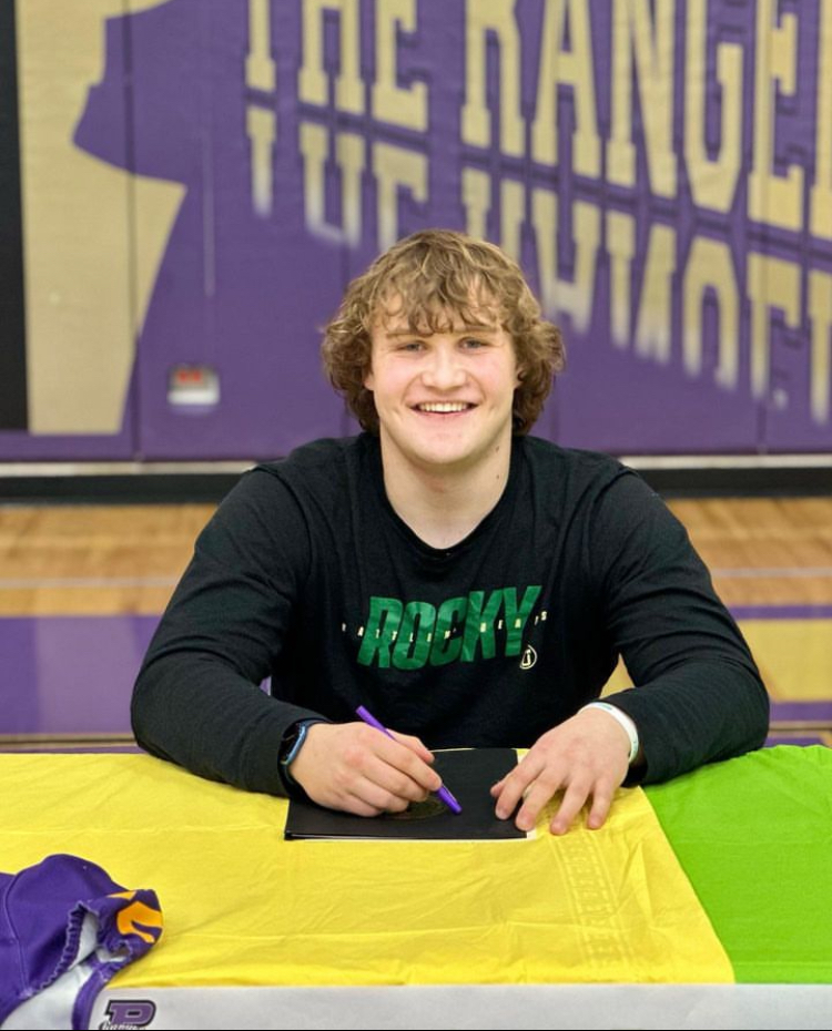 Senior Cole Bartz beams on signing day as he commits to Rocky Mountain College