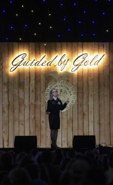 PHS Alumni Haley Rigler delivers a speech to the crowd of nearly 3,000 people at the state convention.  