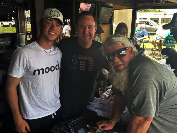 Senior Houston Dunn and his step dad, Matt Blades, met professional golfer John Daly at the Masters tournament.