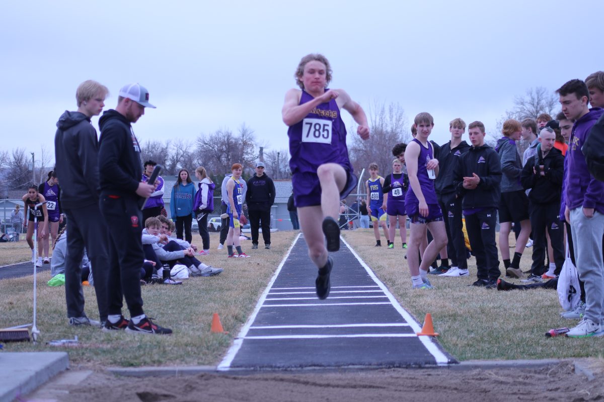 Senior Lyle McCormick competes in the long jump at a Lewistown track meet this spring.