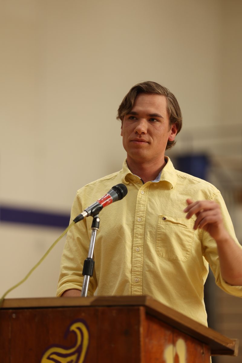 Student council president William Tyner speaks at an all-school assembly at the beginning of the school year.