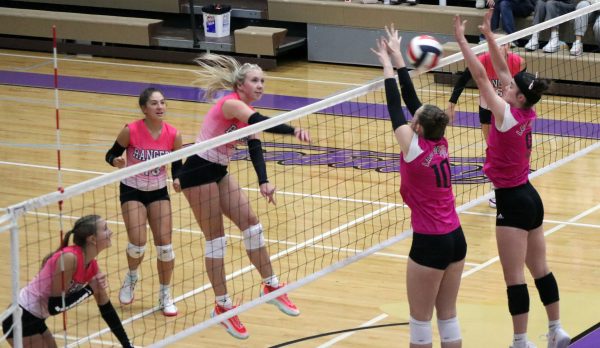 Ellie King jumps up to spike the ball onto the other side of the court. The Rangers played against Glendive in the Park High Gym. 