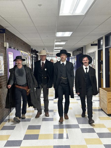 B-pod teachers Andrew Marsh, Kyle Neibauer, Nathaniel Mussetter, and Terry Parker dressed as famous Western lawmen for Duo Day.