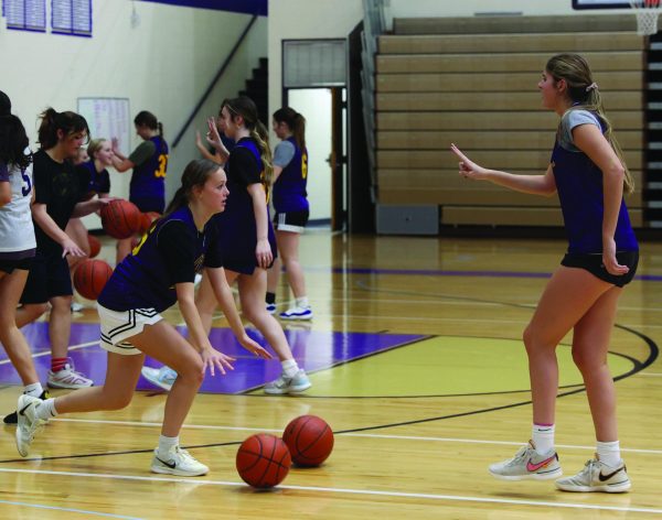 The girls basketball team completes drills on the first day of practice.