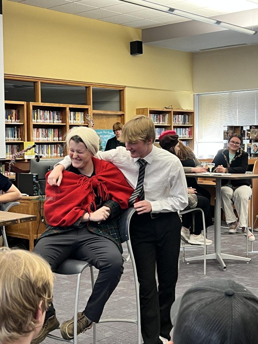 The proper Miss Jean Brodie tries to reject Mr. Stanley's advances while actor Malloi Lannan tries to keep a straight face.