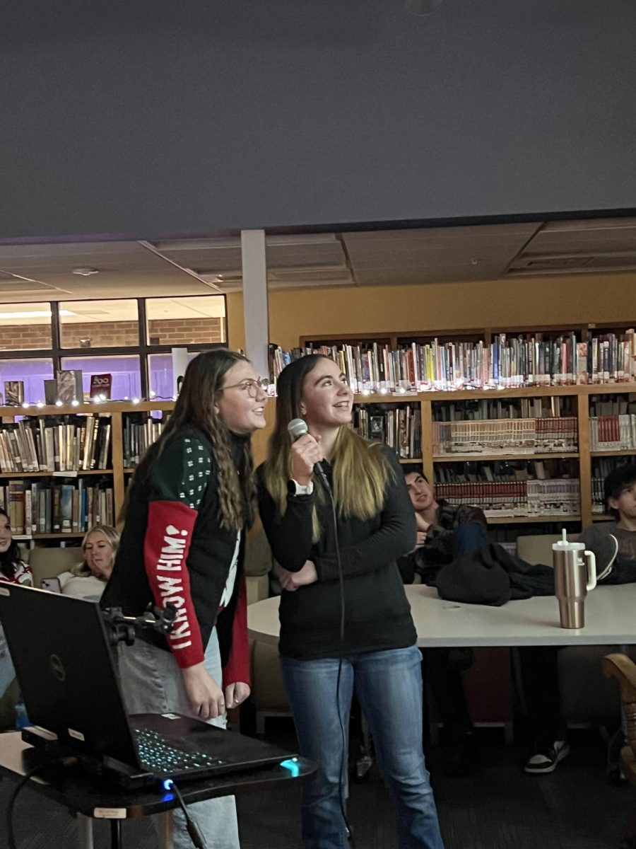 Annaleece Frederickson and Sophie Sestrich sing a duet of "Baby, It's Cold Outside."