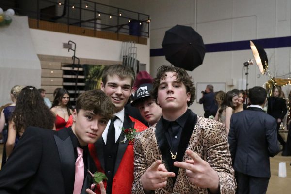 Juniors Ryder Clayton, Stacy Sundling and Ben Cipriani show off their suits at Winter Formal.