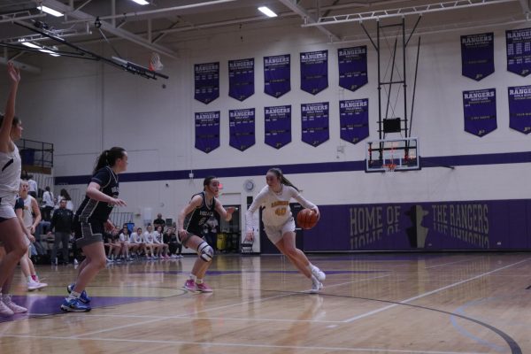 Sophomore Maria Turck makes a drive Tuesday January 21st against the East Helena Vigilantes. 