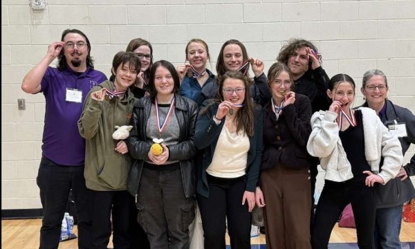 The Park High Speech Drama and Debate team shows off their medals at this year's divisional meet held on January 25. 