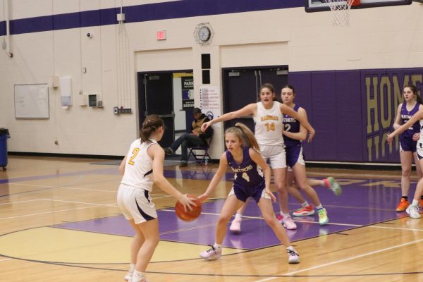 Sophomore Lexi Melin looks for an open teammate to make a pass. The final score was 14-69 resulting in a loss for the Lady Rangers.