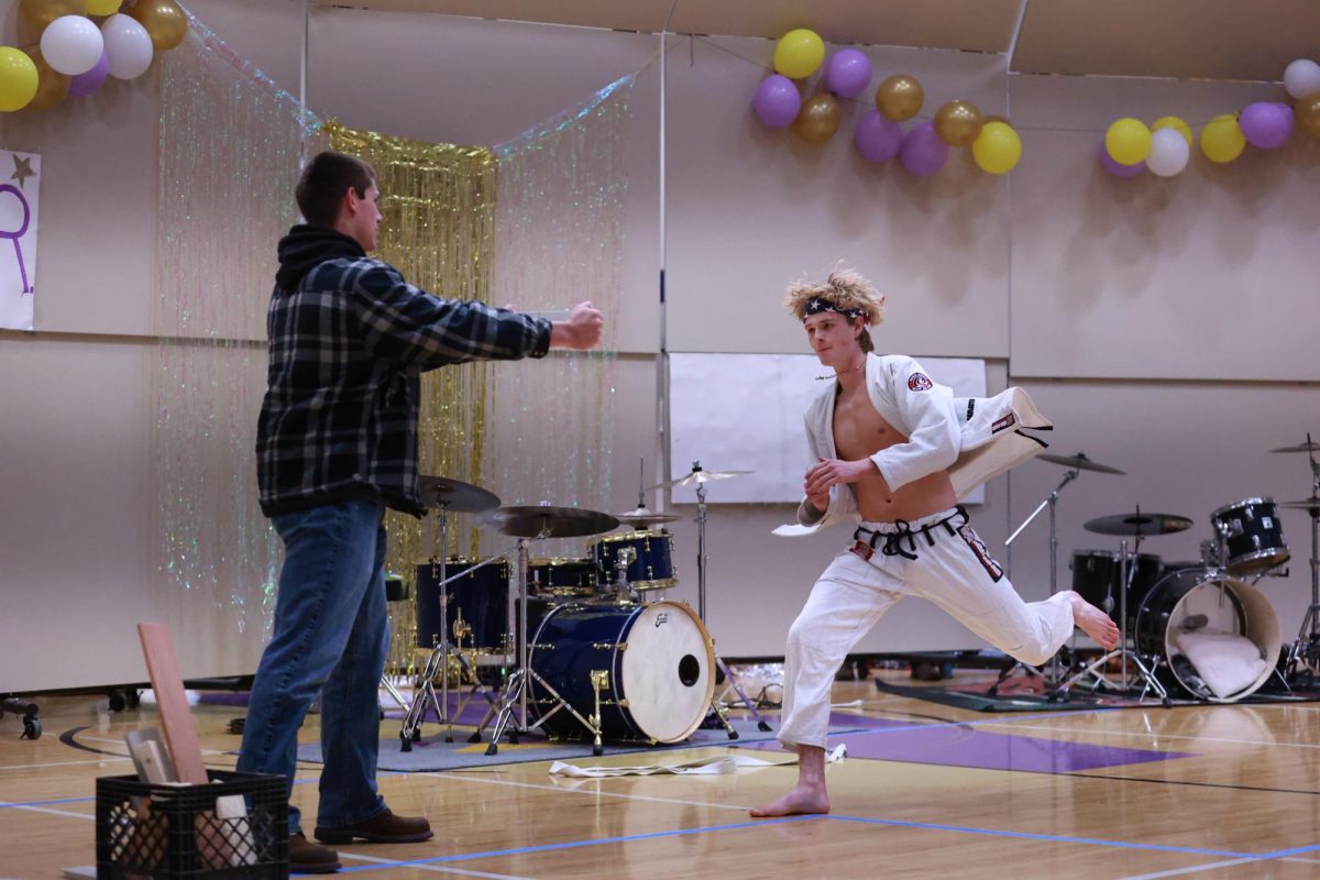 Jon Durgan approaches Jaxson White with his kung fu moves.