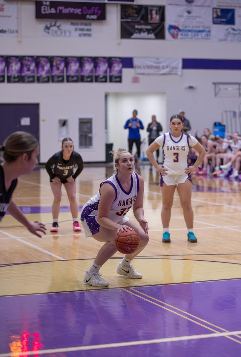 Center Olivia Behm, at the line against East Helena, is key to rebounding for the Rangers. 