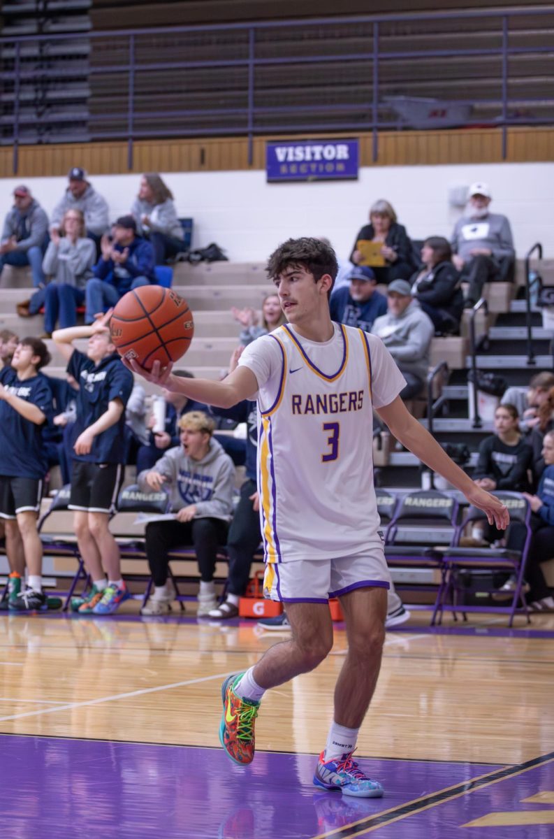 Brody Leininger looks to pass to a teammate. He is the leading scorer on the current Ranger roster.